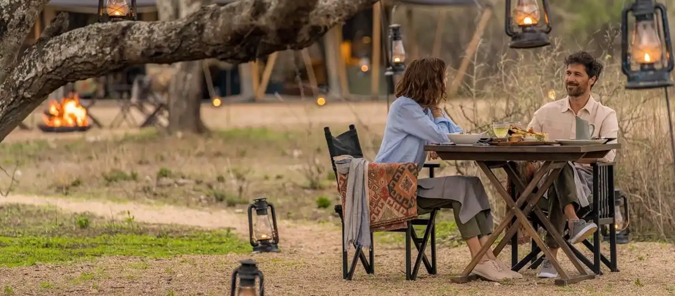 Sunrise glow over a Serengeti camp